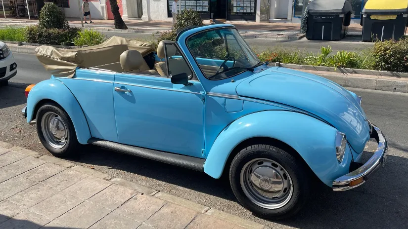 Blue classic Volkswagen Beetle convertible used as reference for Meshy AI 3D model