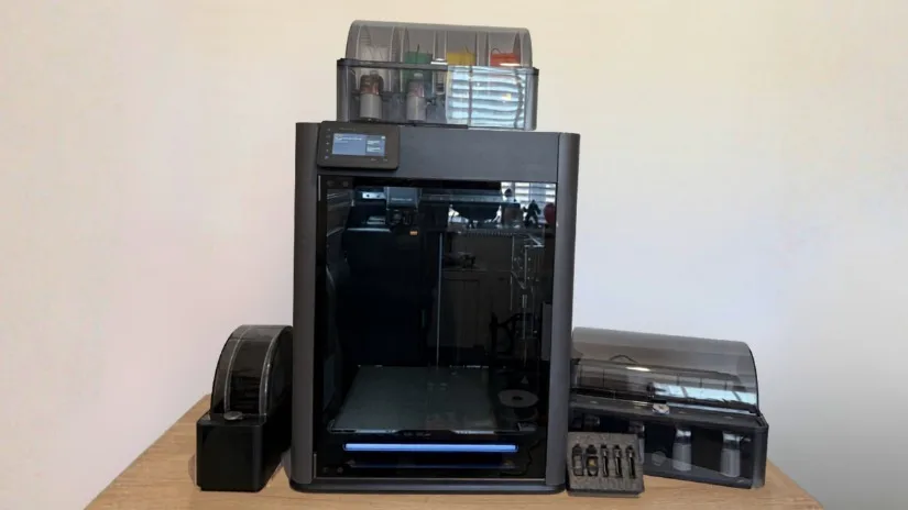 The Bambu Lab H2C and connected filament-handling equipment in my workspace.