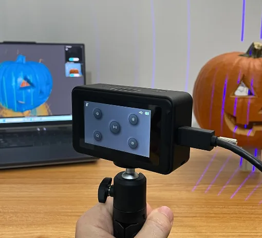 Creality Pika 3D scanner using blue laser mode to scan a carved pumpkin