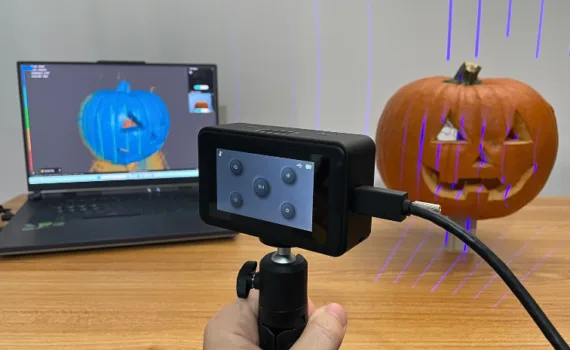 Creality Pika 3D scanner using blue laser mode to scan a carved pumpkin