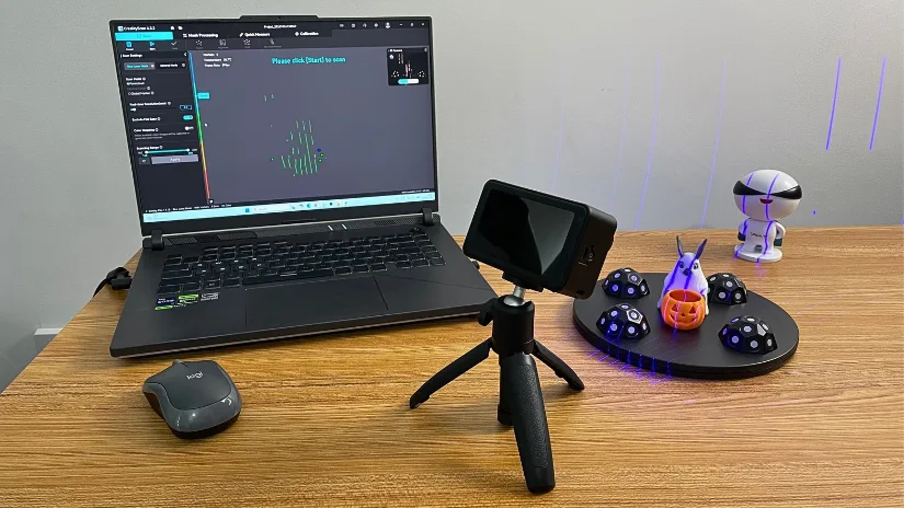 Creality Pika wirelessly scanning a small Halloween 3D printed model on a marker turntable
