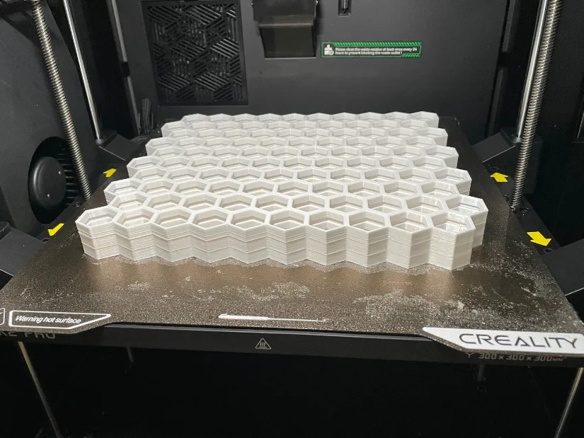 Stacked white eSUN PETG Honeycomb Storage Wall sections printed on the Creality K2 Pro