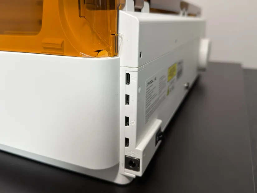 Close-up of the rear power and connection ports on the xTool M2