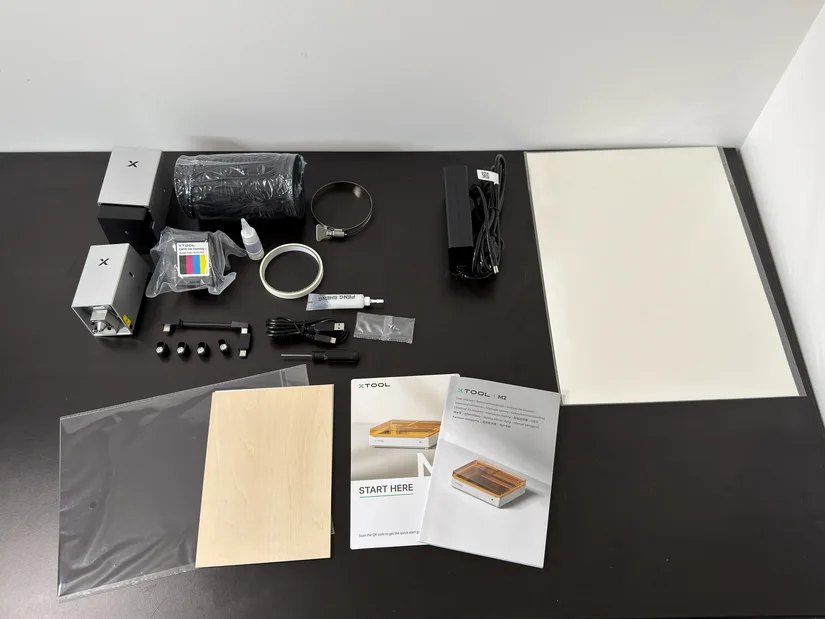 xTool M2 accessories unpacked alongside the machine