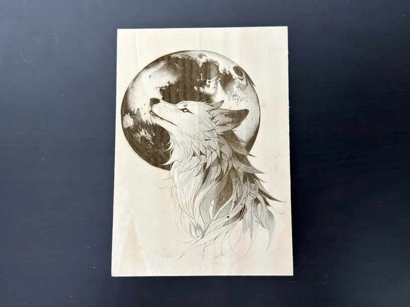 Detailed wolf engraving on basswood made with the xTool M2 10W laser
